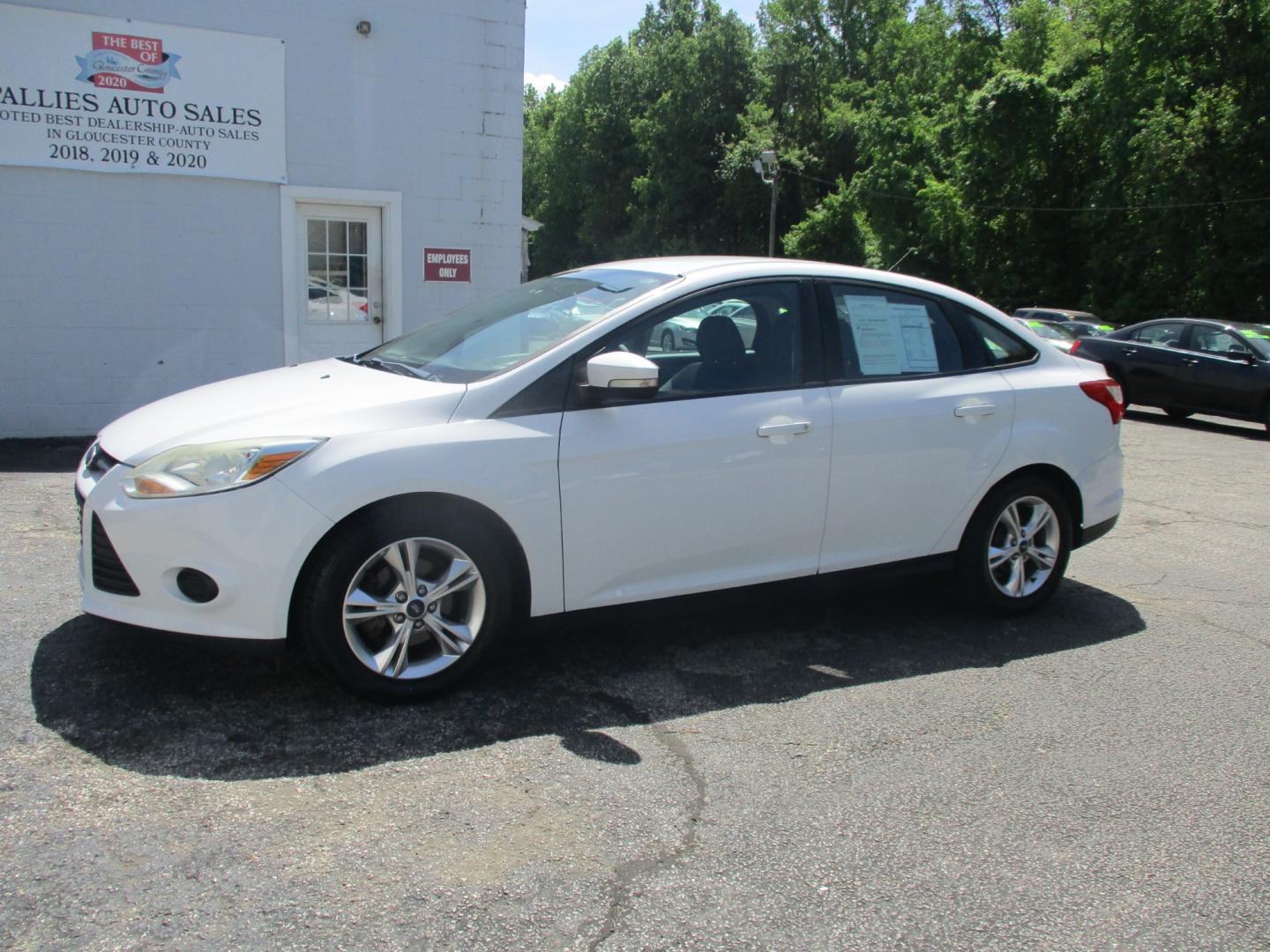 2014 WHITE Ford Focus SE Sedan (1FADP3F28EL) with an 2.0L L4 DOHC 16V engine, located at 540a Delsea Drive, Sewell, NJ, 08080, (856) 589-6888, 39.752560, -75.111206 - Photo#1